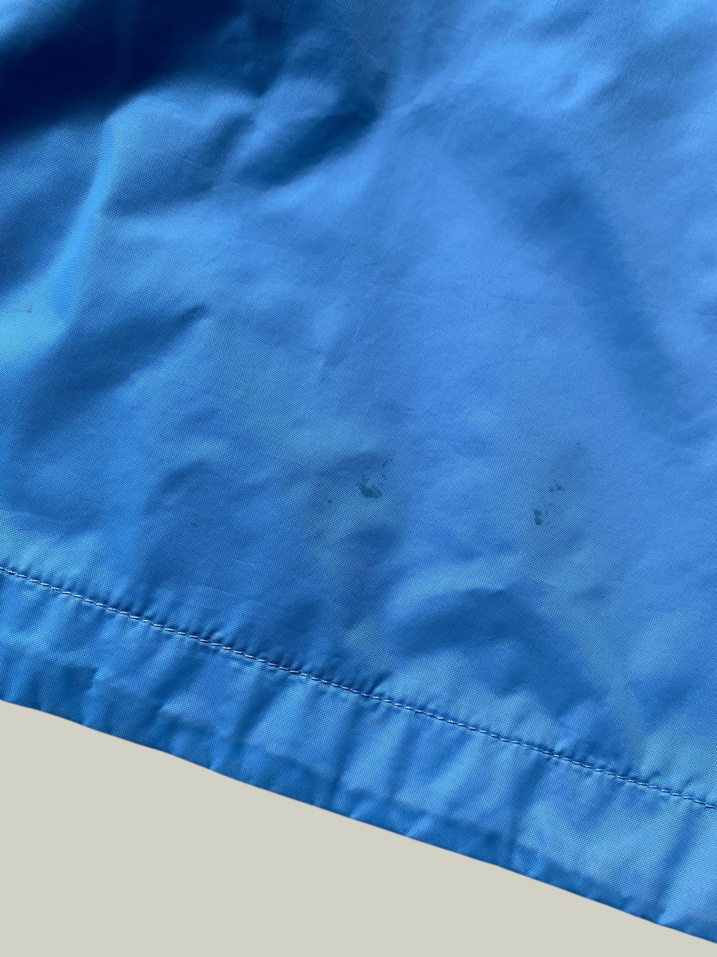 Blue two tine rain jacket 7-8Y | The North Face