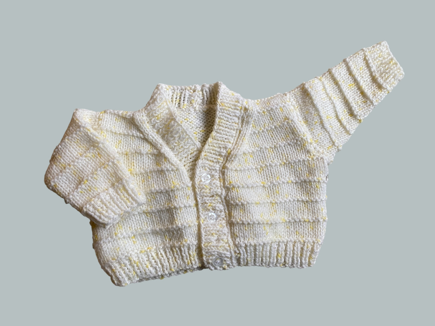 Hand knit cream with yellow speckles cardigan 0-6m