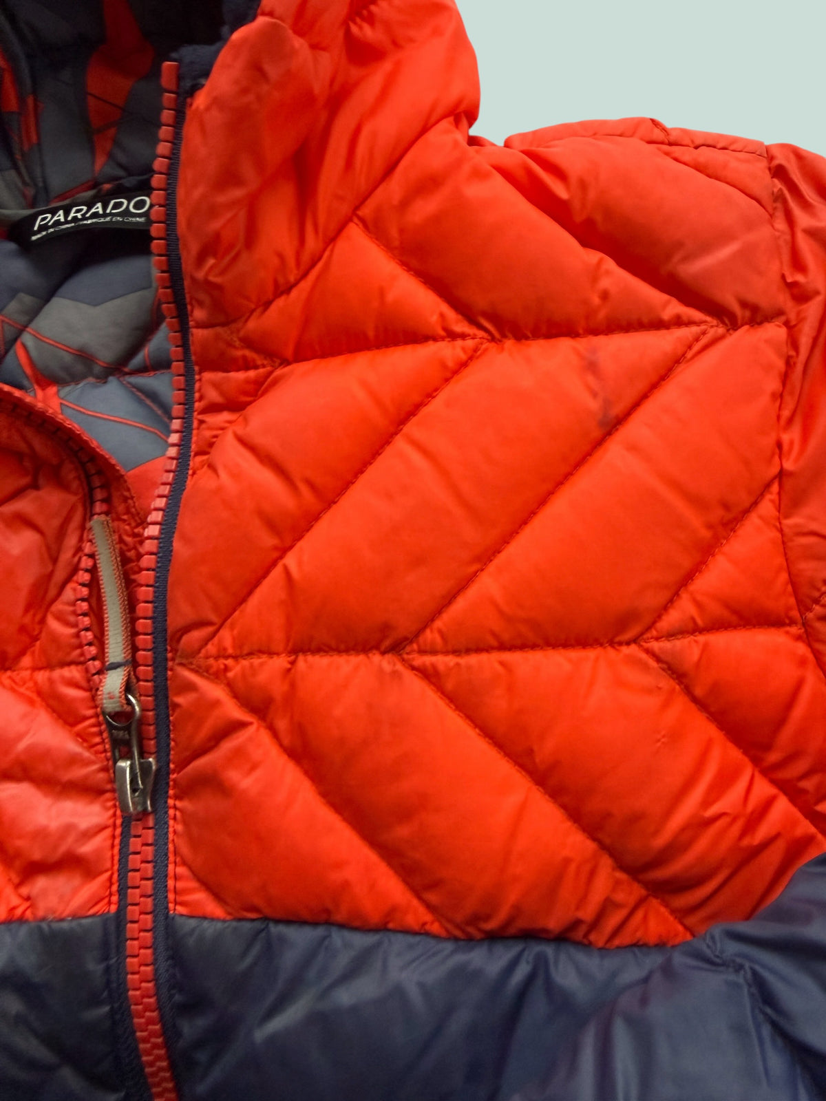 Orange and blue puff jacket 6Y | Paradox