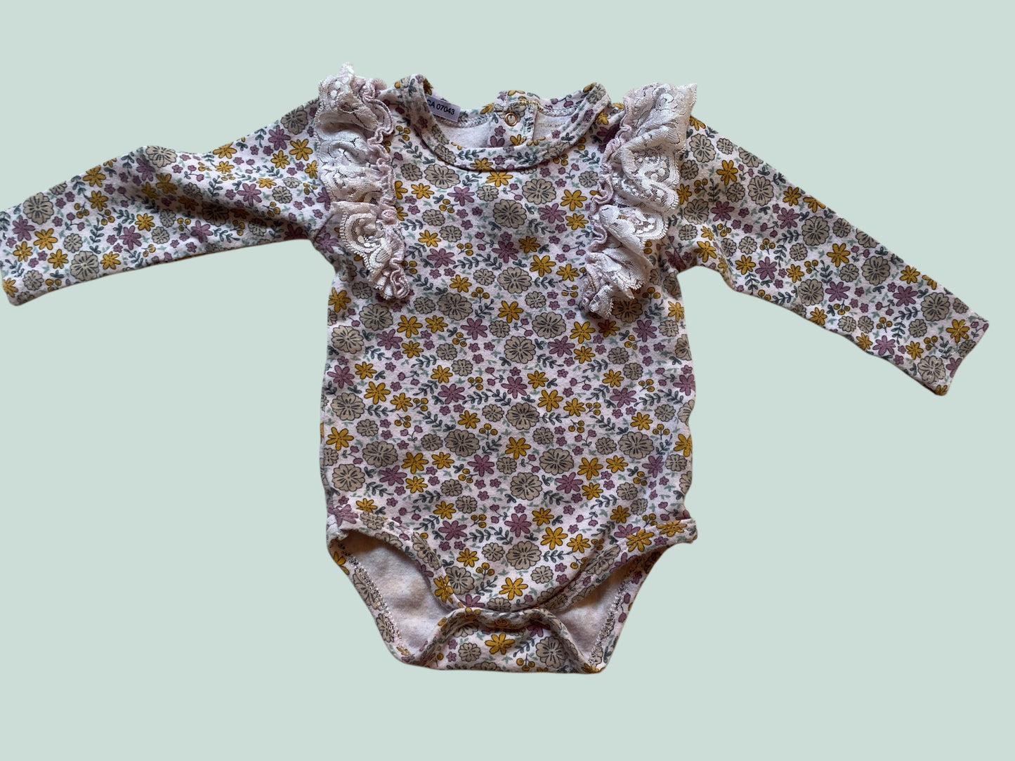 Cotton flower onesie with ruffles 12m | Tahari