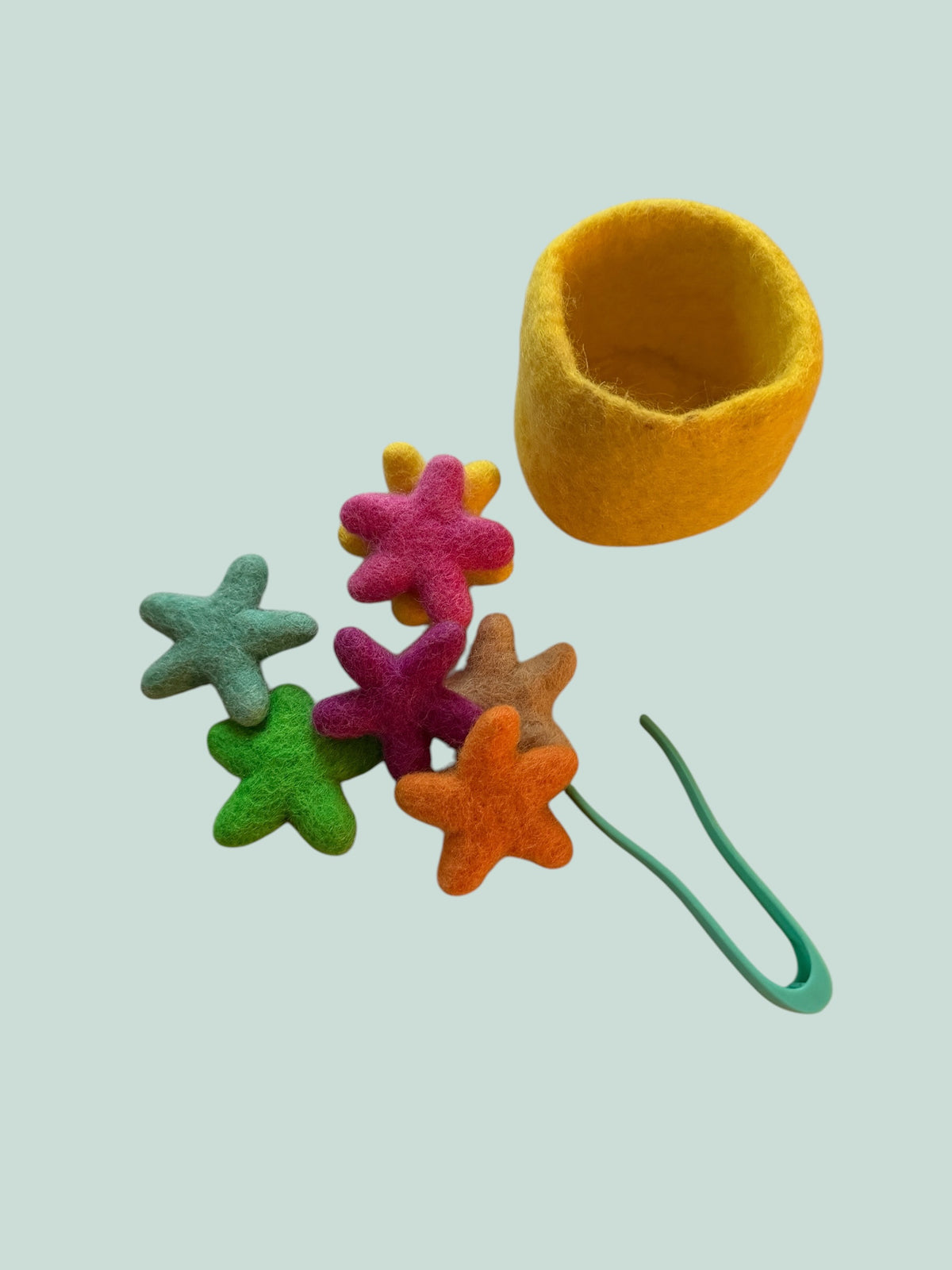 Felted stars with tweezers | Lovevery