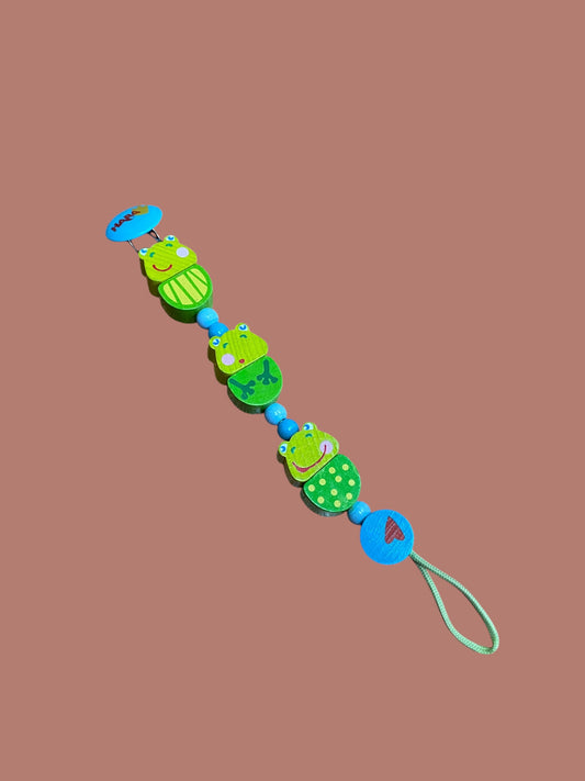 Wooden frog pacifier attachment | Haba