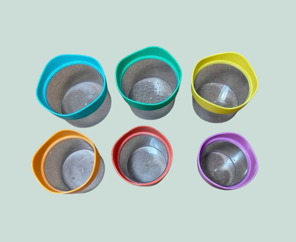 Nesting drip drop stacking bath toy cups | Lovevery