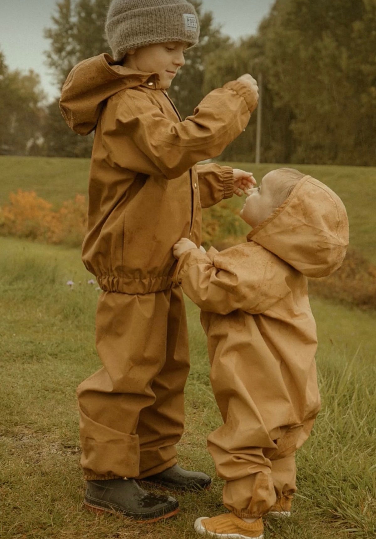 Rust coloured "Aviator" rain jacket 6-8Y | Fairechild
