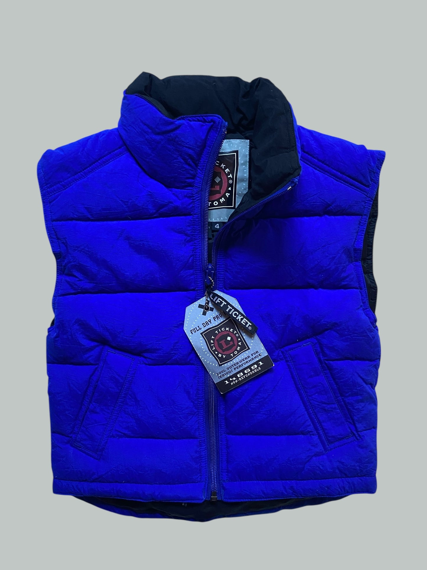 Down filled electric blue winter vest 4Y | Lift Ticket