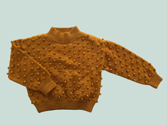 Merino wool popcorn sweater in marigold 5Y | Misha & Puff