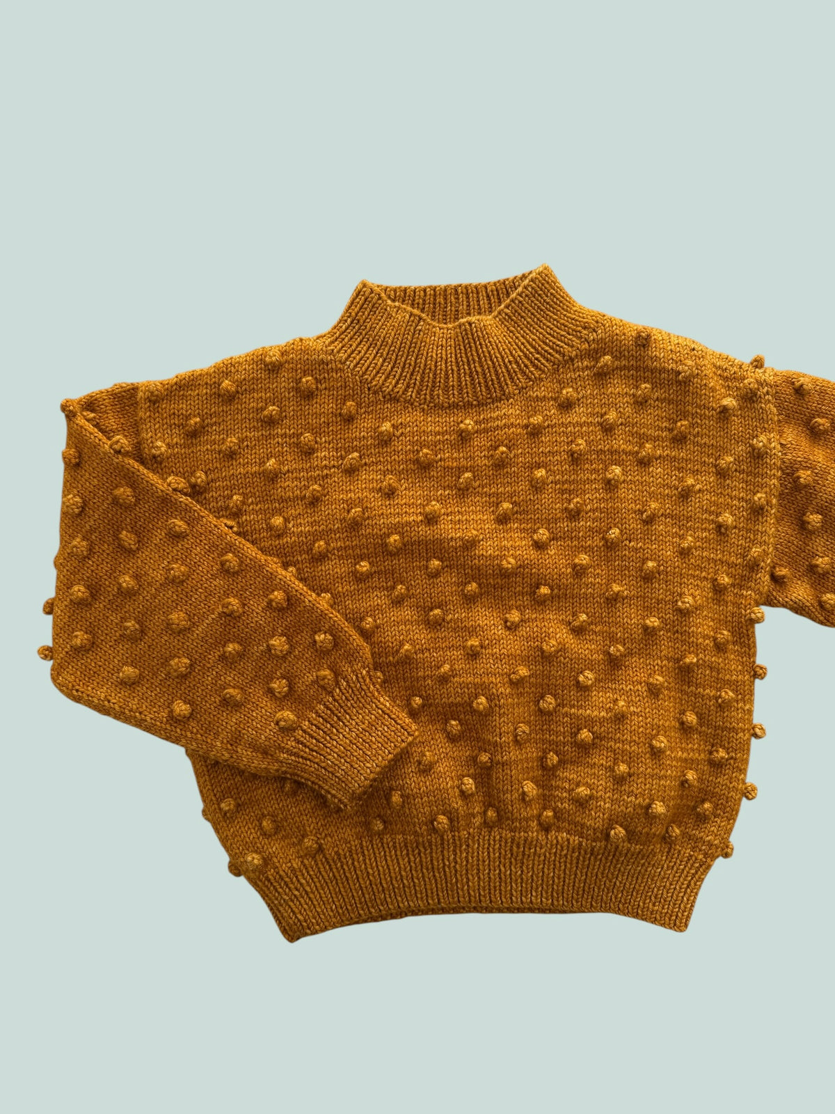 Merino wool popcorn sweater in marigold 5Y | Misha & Puff