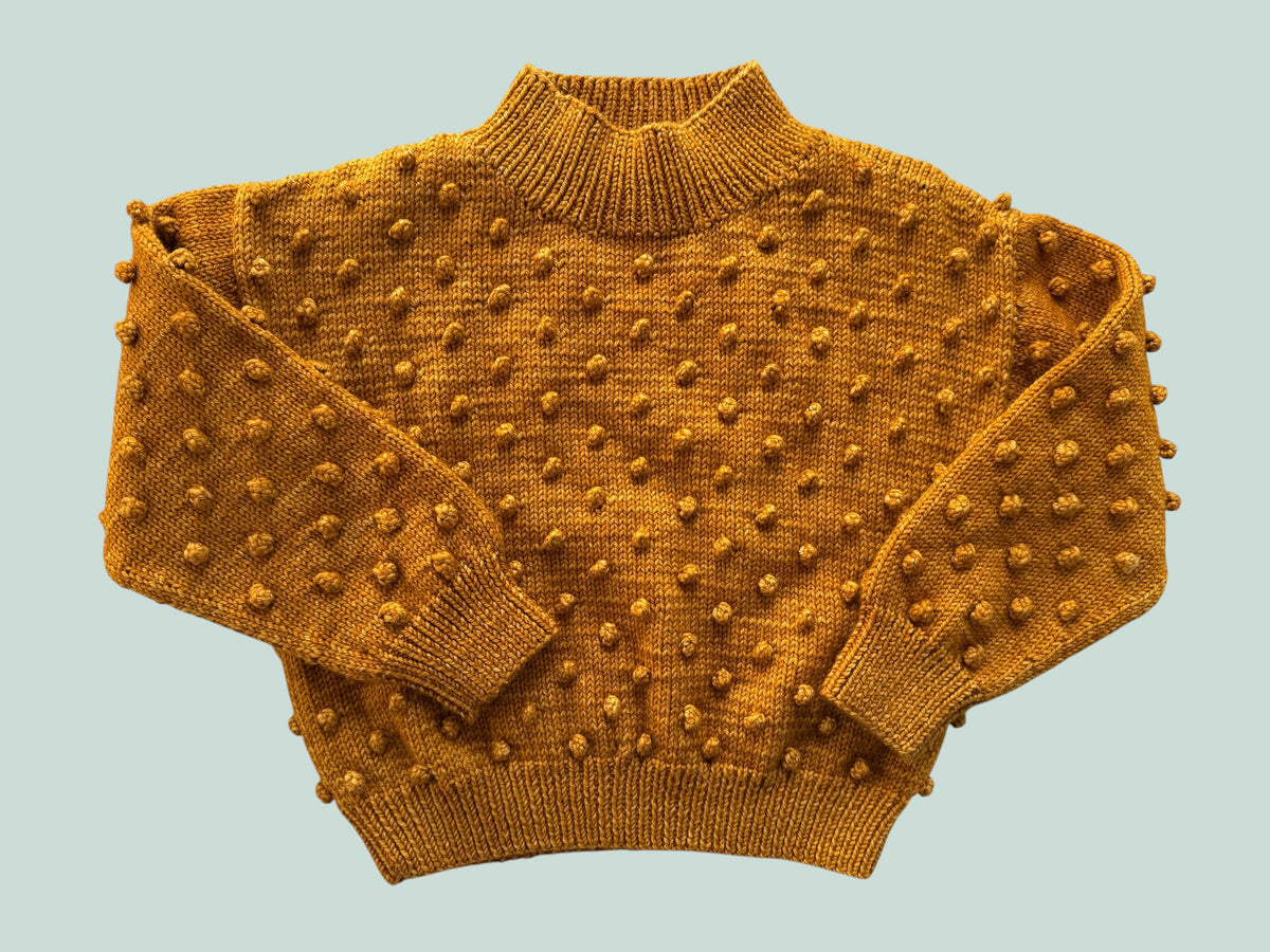 Merino wool popcorn sweater in marigold 5Y | Misha & Puff